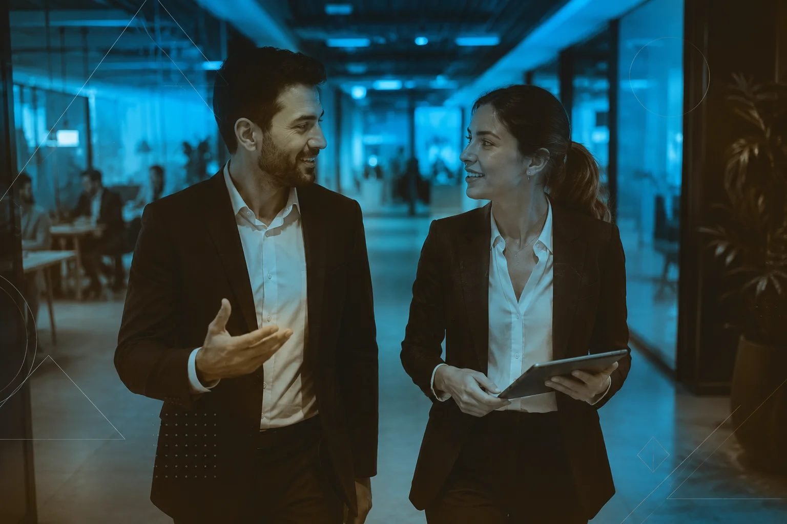 Colleagues walking and discussing strategy in the office, Imbue Horizon